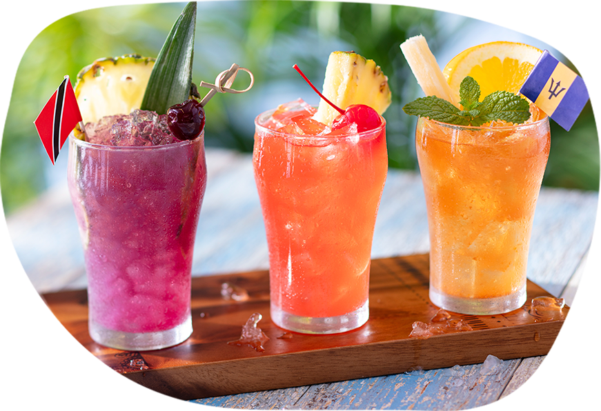 Carnival Cocktail Flight featuring King Carnival, Barbados Rum Punch, and Trinidad Sour