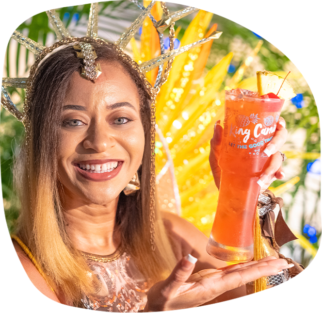 King Carnival cocktail dancer in festive attire