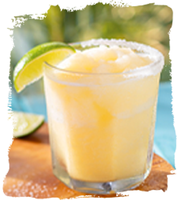 Classic Frozen Margarita with a lime wedge garnish from Bahama Breeze.