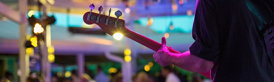 Bahama Breeze Live Music A musician plays live music for a crowd at Bahama Breeze